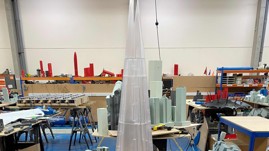 RWDI SLA Printed Shard Model With FMD Printed Red Models In Background Landscape